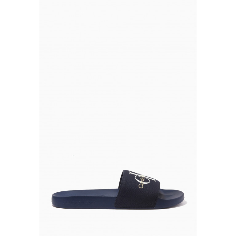 Calvin Klein Jeans - Monogram Slides in Cotton Canvas Blue