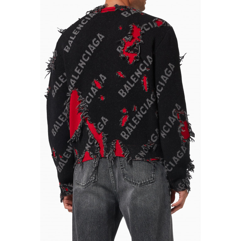 Balenciaga - All-over Logo Repatch Crewneck Sweater in Distressed Wool-blend Knit