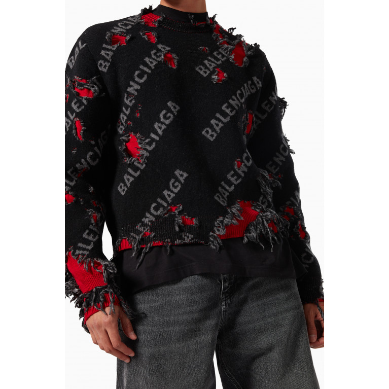 Balenciaga - All-over Logo Repatch Crewneck Sweater in Distressed Wool-blend Knit
