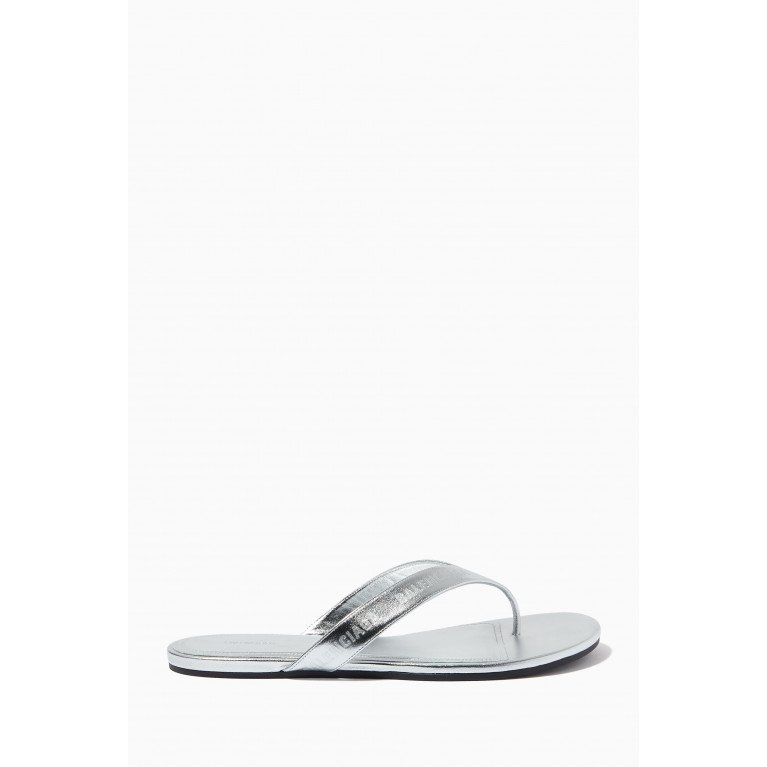 Allover Logo Round Thong Sandals in Metallic Sheepskin Silver