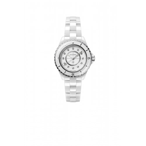 CHANEL - White highly resistant ceramic and steel, diamond indicators