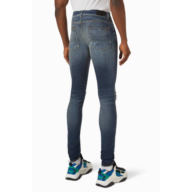 Amiri - MX1 Distressed Skinny Jeans in Stretch Denim & Leather Blue