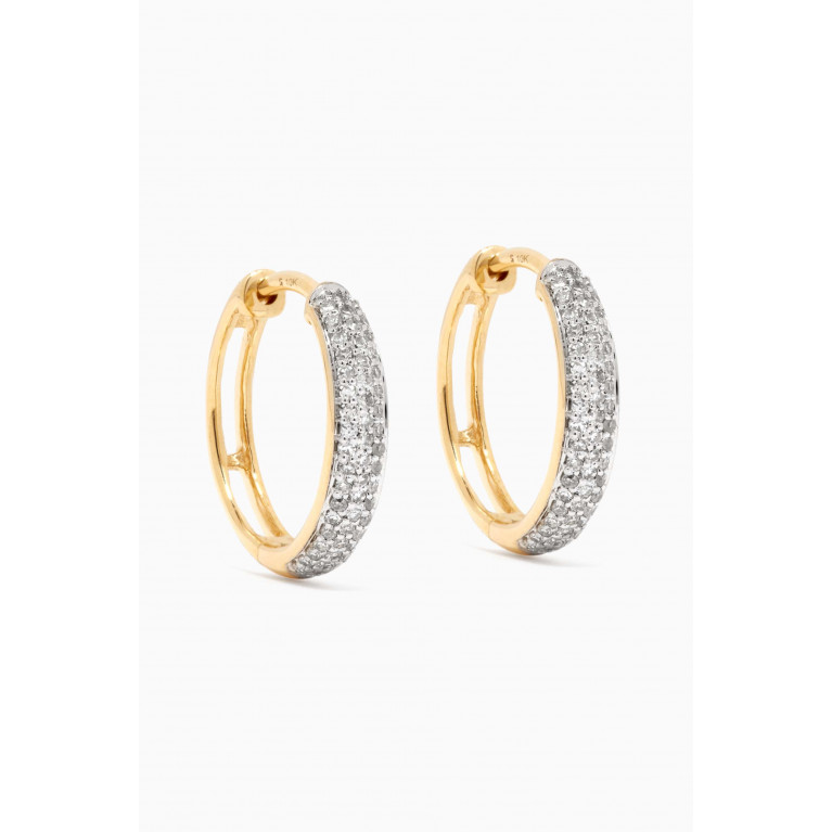 STONE AND STRAND - Diamond Orb Huggie Earrings in 10kt Yellow Gold