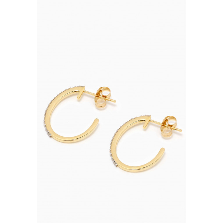 STONE AND STRAND - Medium Pave Oval Hoop Earrings in 10kt Yellow Gold