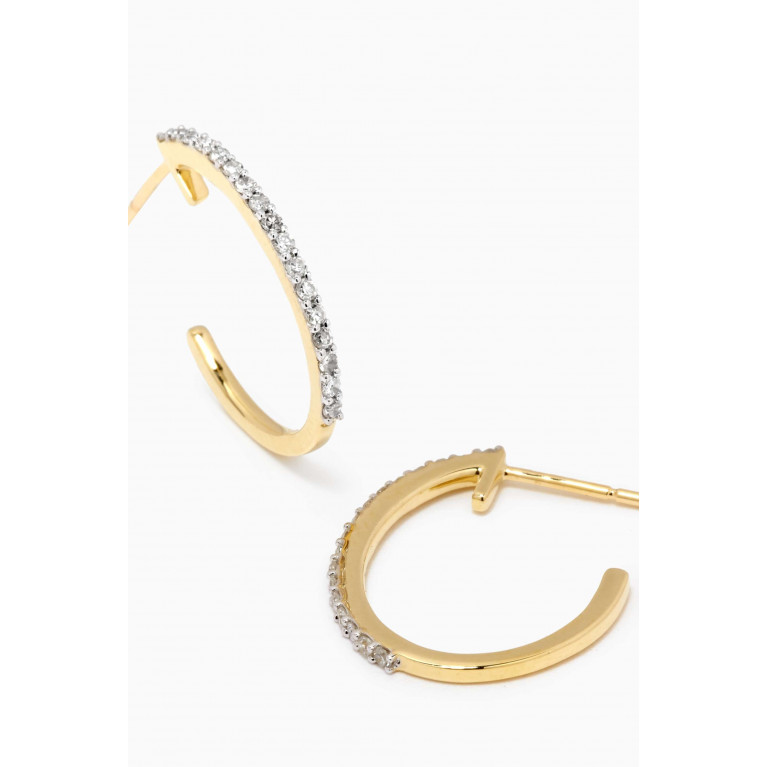 STONE AND STRAND - Medium Pave Oval Hoop Earrings in 10kt Yellow Gold