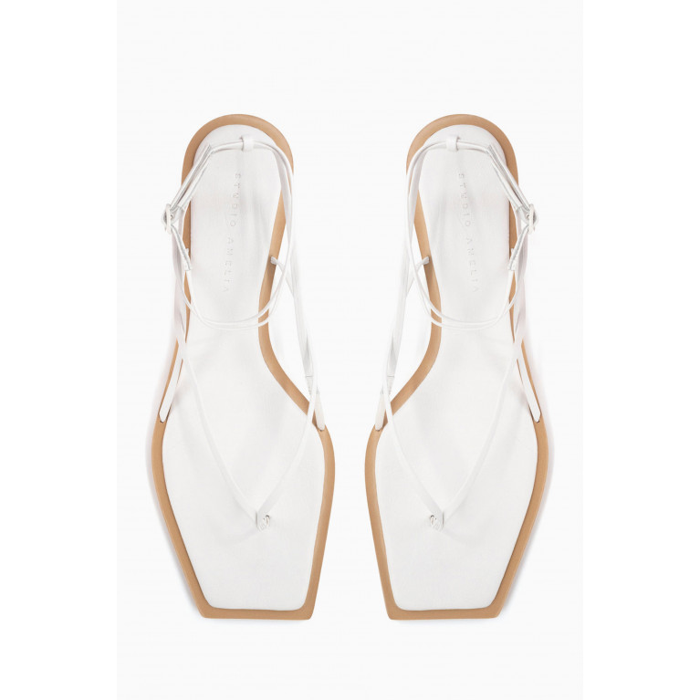 Studio Amelia - Slingshot Thong Flat Sandals in Nappa White