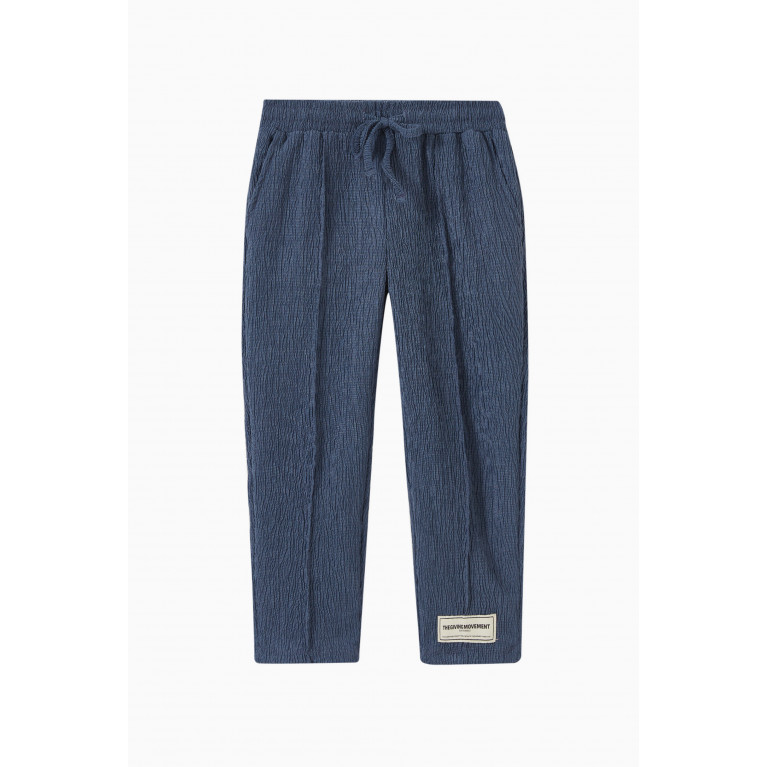 The Giving Movement - Straight-fit Pants in RE-CRINK100© Blue
