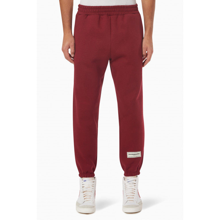 The Giving Movement - Logo Patch Sweatpants in Organic Fleece Red