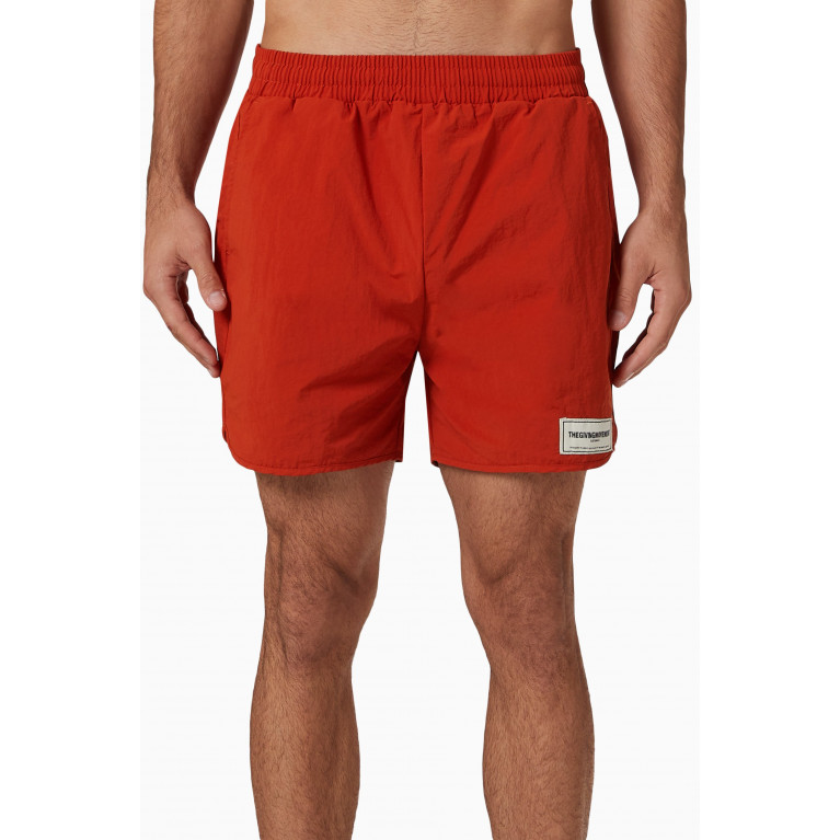 The Giving Movement - Swim Shorts in RE-SHELL100© Orange