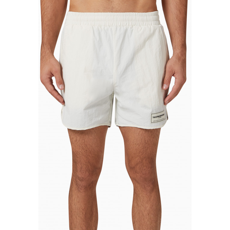 The Giving Movement - Swim Shorts in RE-SHELL100© Neutral
