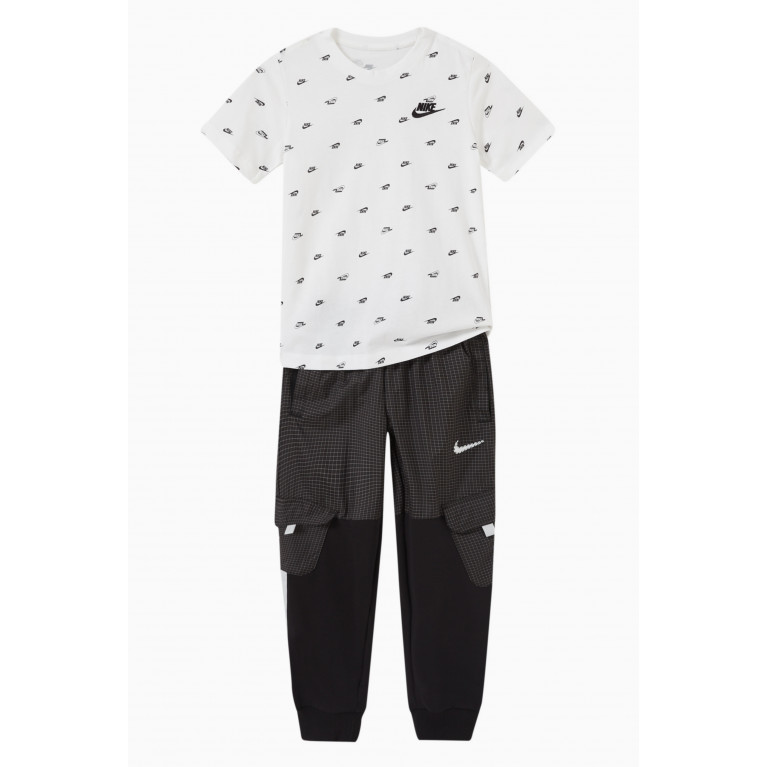 Nike - All-over Logo Print T-Shirt in Cotton