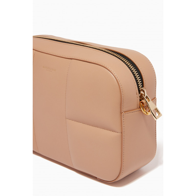Demellier - The Marrakesh Crossbody Bag in Padded Smooth Leather Neutral