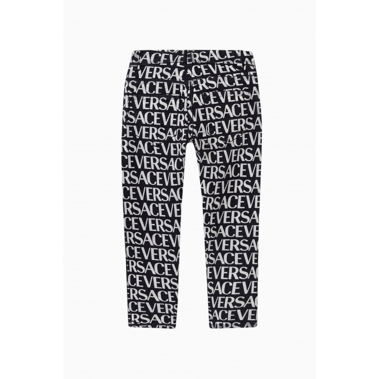 Versace - Versace - All-over Logo Denim Jeans in Cotton