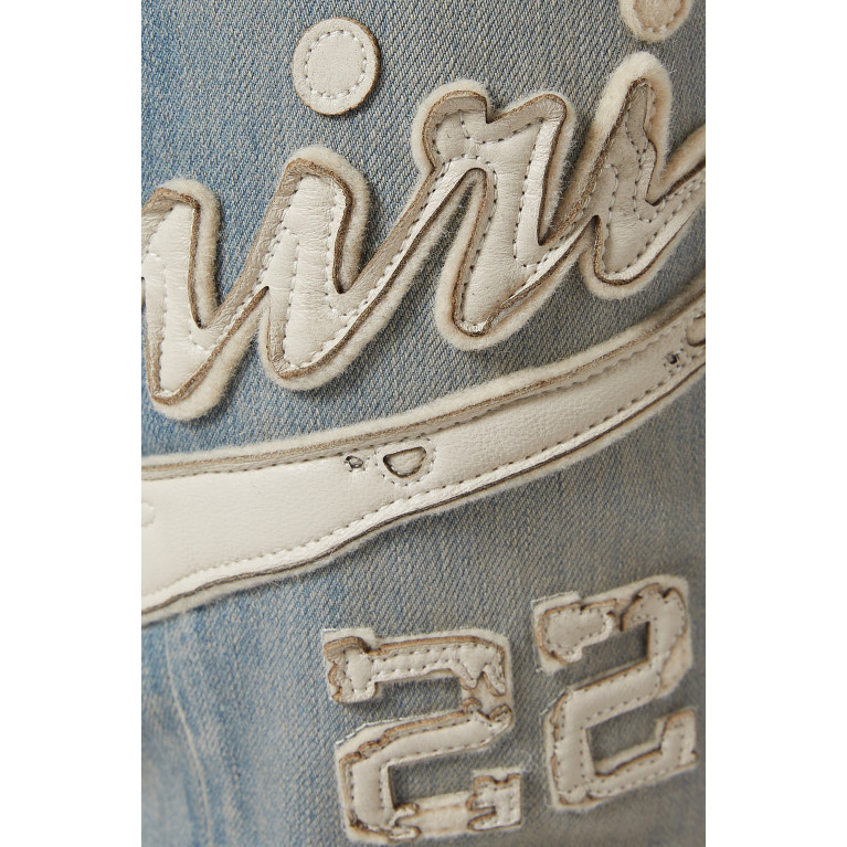 Amiri - Varsity Appliqué Logo Jeans in Denim