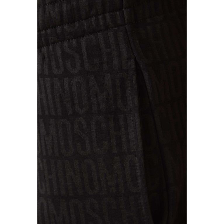 Moschino - All-over Logo Sweatpants in Cotton-fleece Black