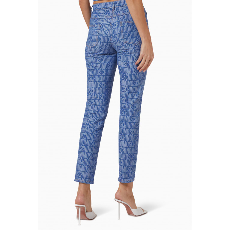 Moschino - All-over Logo Slim-fit Jeans in Denim