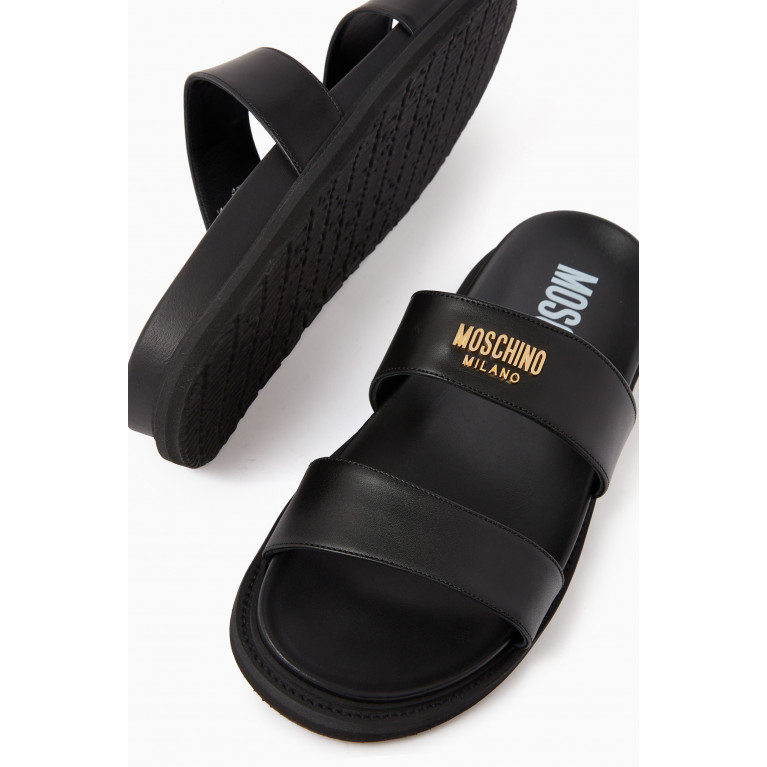 Moschino - Gold Tone Logo Plaque Sandals in Leather