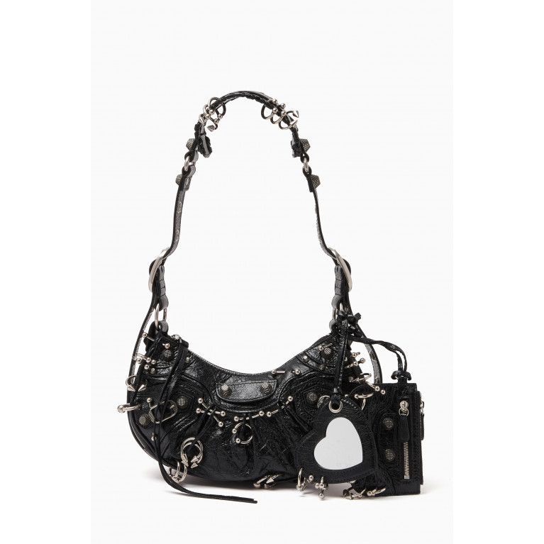 Balenciaga - Le Cagole XS Shoulder Bag with Piercings in Arena Lambskin