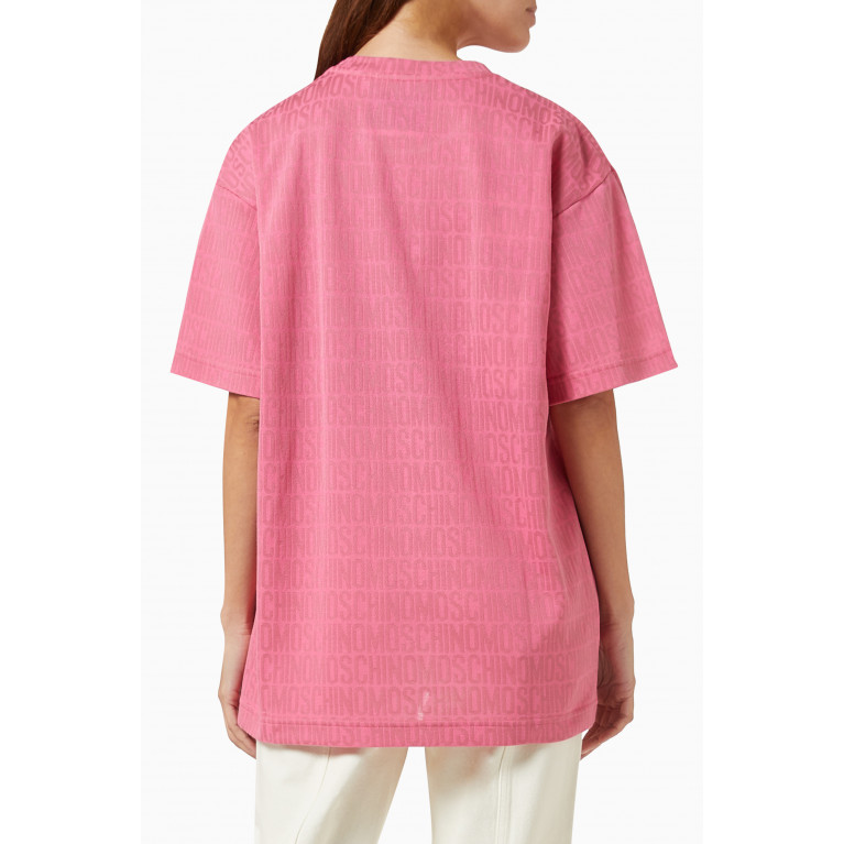 Moschino - All-over Logo Oversized T-shirt in Jersey Pink