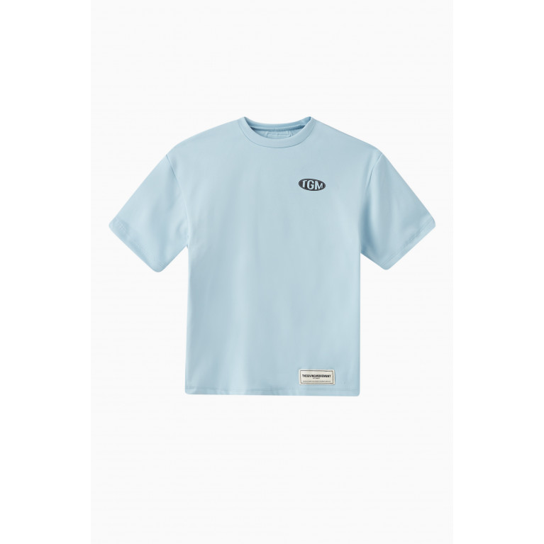 The Giving Movement - Oversized Logo T-shirt in Polyester-blend Blue