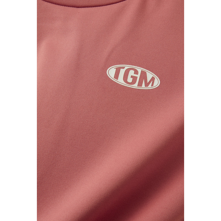 The Giving Movement - Oversized Logo T-shirt in Polyester-blend Pink