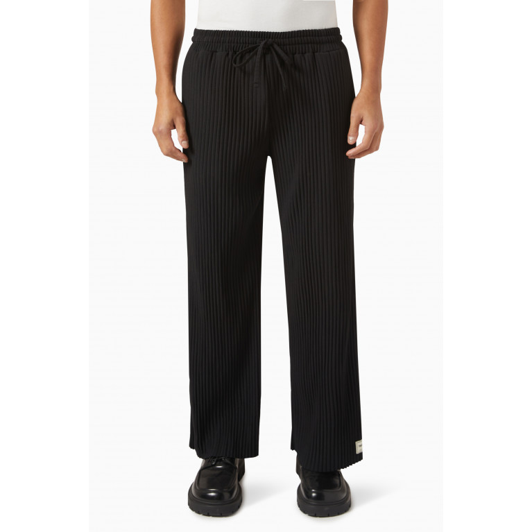 The Giving Movement - Wide-leg Pants in PLISSE100© Black