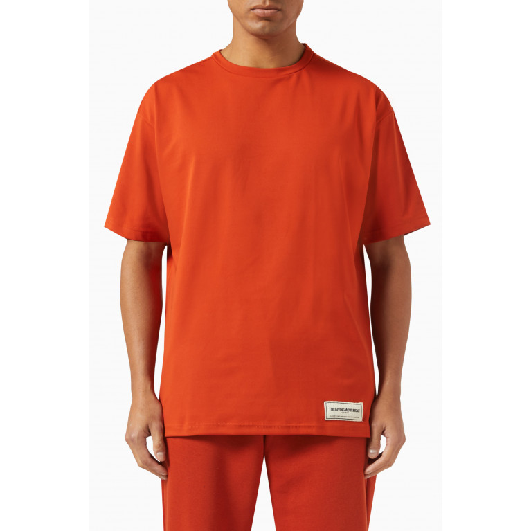 The Giving Movement - Oversized T Shirt in Light Softskin100© Orange