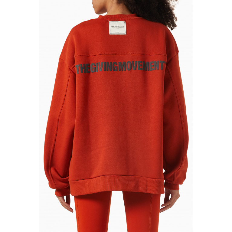 The Giving Movement - Oversized Sweatshirt in Organic-cotton Orange