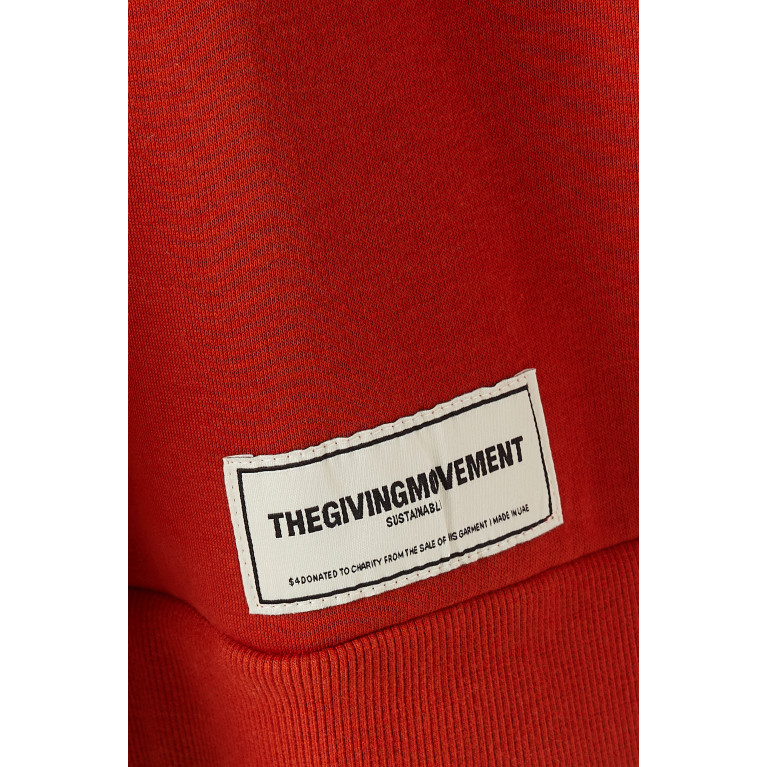 The Giving Movement - Oversized Sweatshirt in Organic-cotton Orange