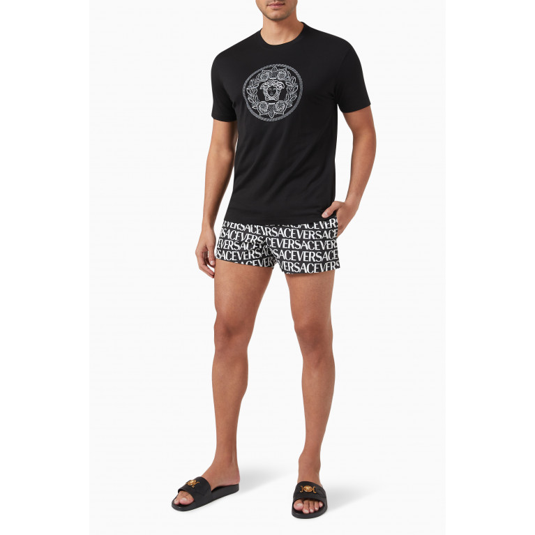 Versace - All-over Logo Swim Shorts in Nylon
