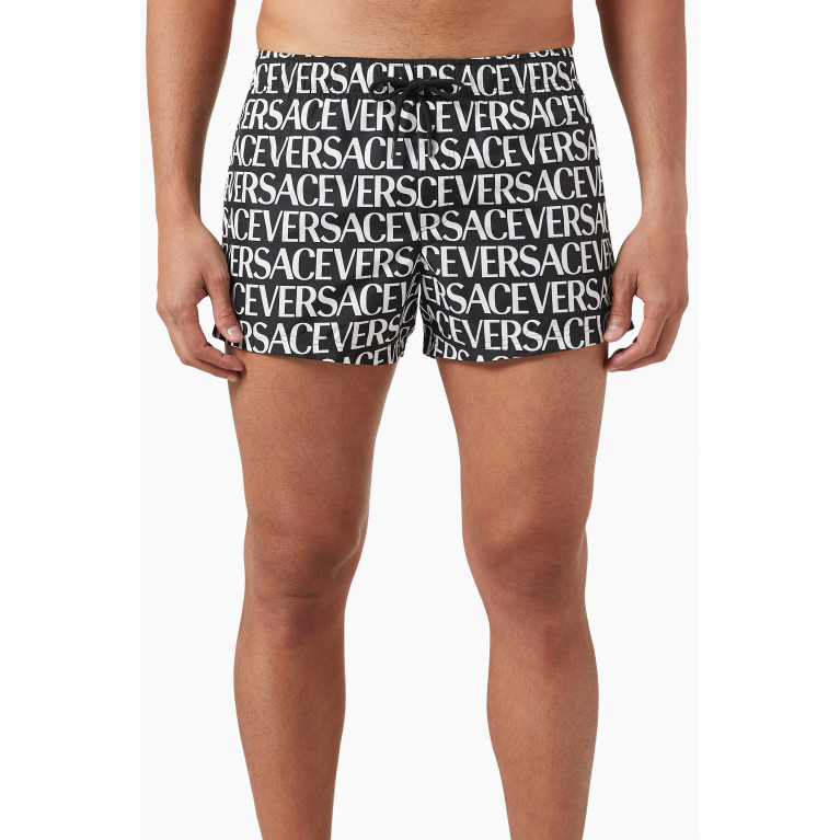Versace - All-over Logo Swim Shorts in Nylon