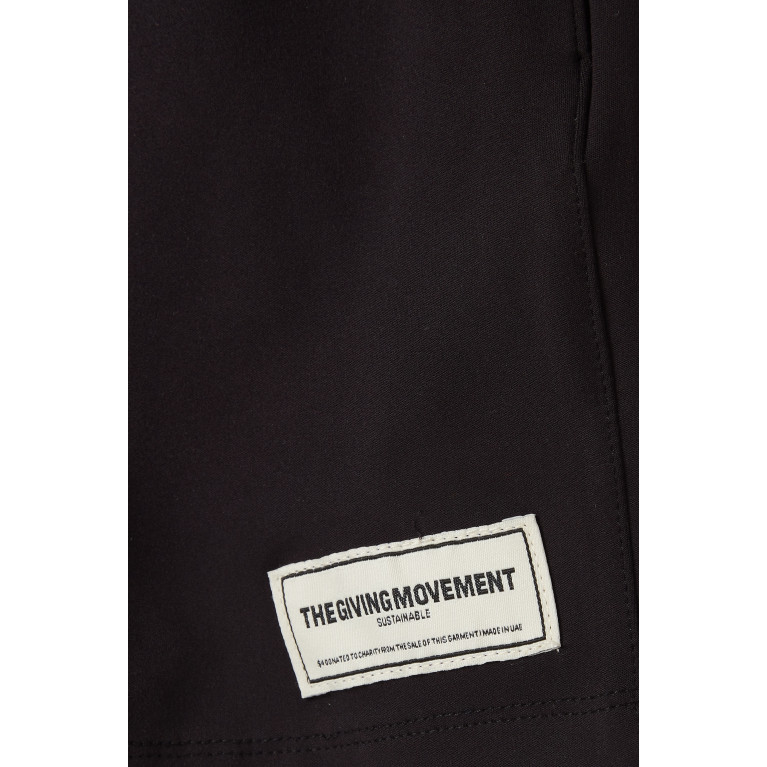 The Giving Movement - Logo Shorts in Light Softskin100© Black