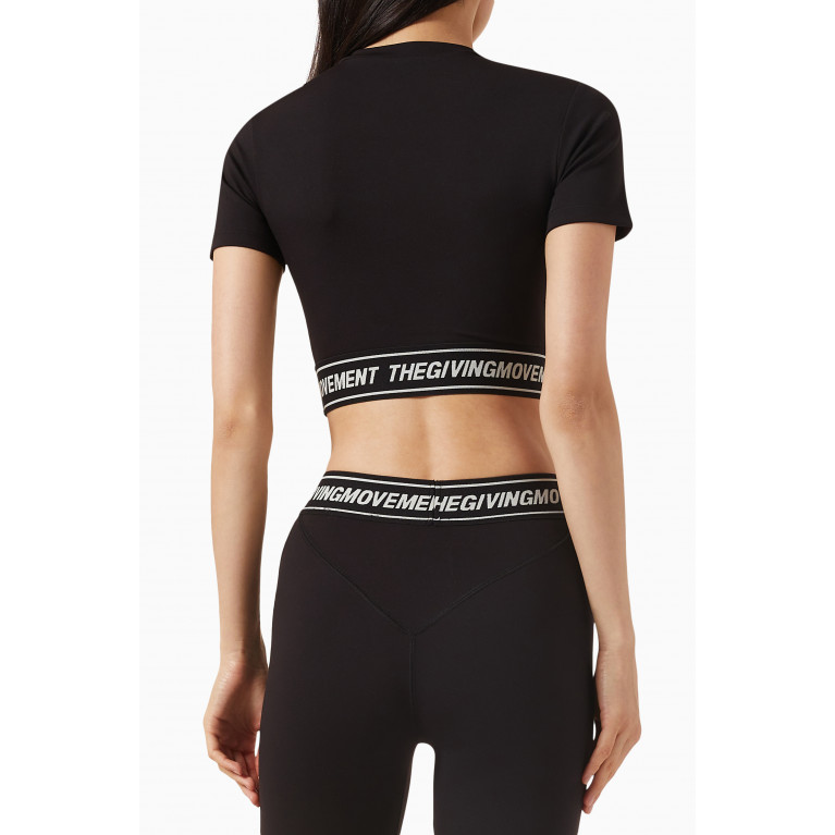 The Giving Movement - Logo Waistband Crop Top in Light Softskin100© Black