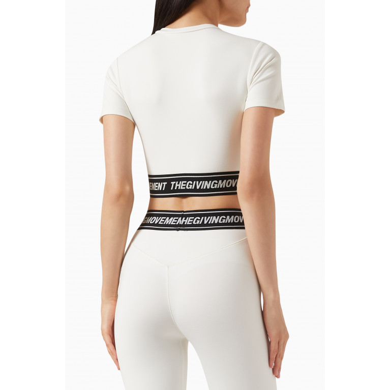 The Giving Movement - Logo Waistband Crop Top in Light Softskin100© Neutral