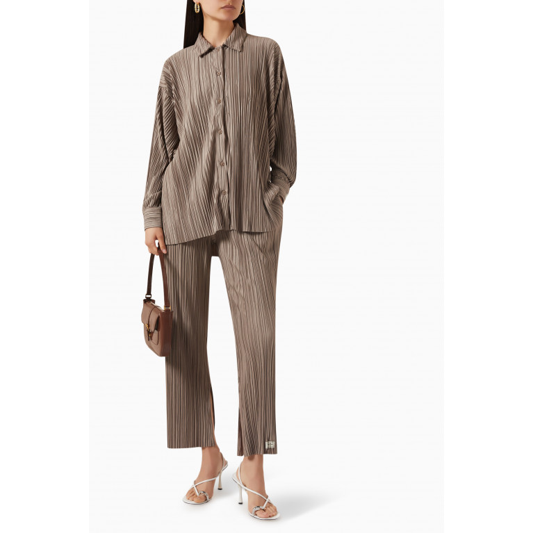 The Giving Movement - Wide-leg Pants in PLISSE100© Neutral