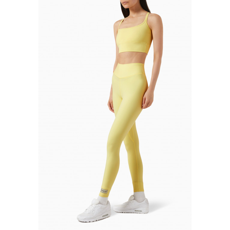 The Giving Movement - Strap-back Sports Bra in Softskin100© Yellow