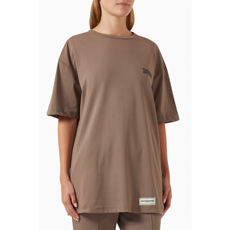 The Giving Movement - Oversized Printed T-shirt in Light Softskin100© Neutral