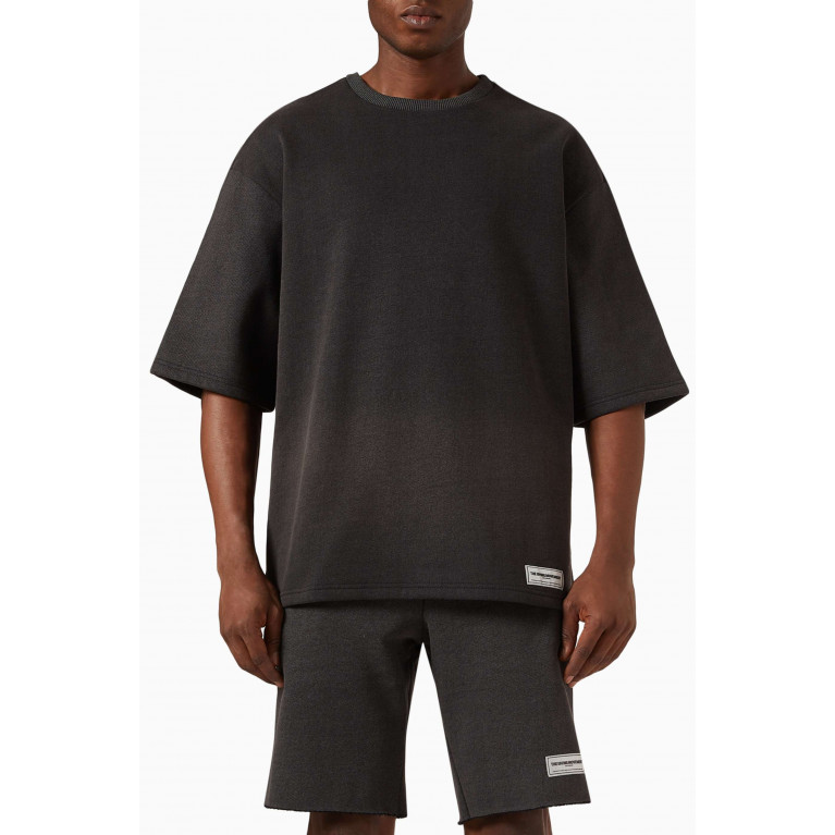 The Giving Movement - Washed Oversized T-shirt in Organic Cotton Black
