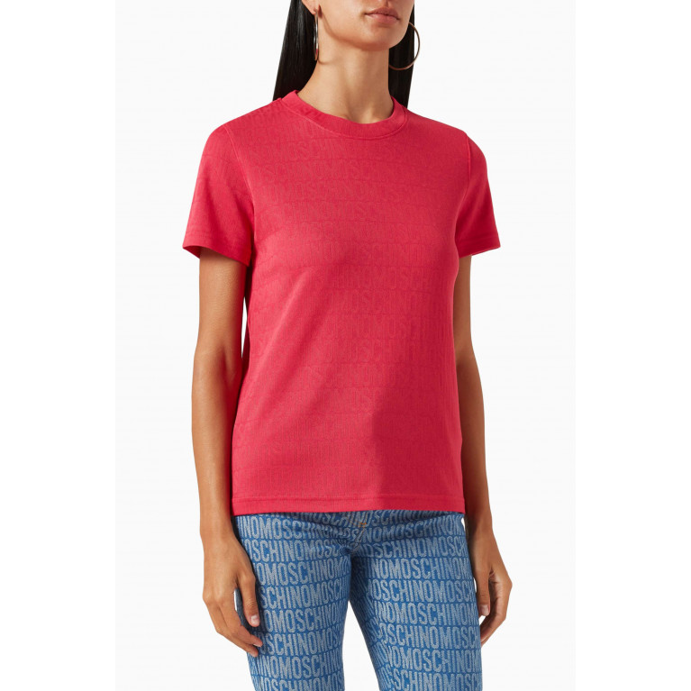 Moschino - All-over Logo T-shirt in Cotton-blend Jersey Pink