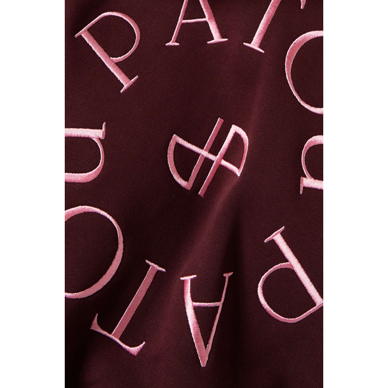 Patou - Medallion Logo Crop Hoodie in Organic Cotton Burgundy