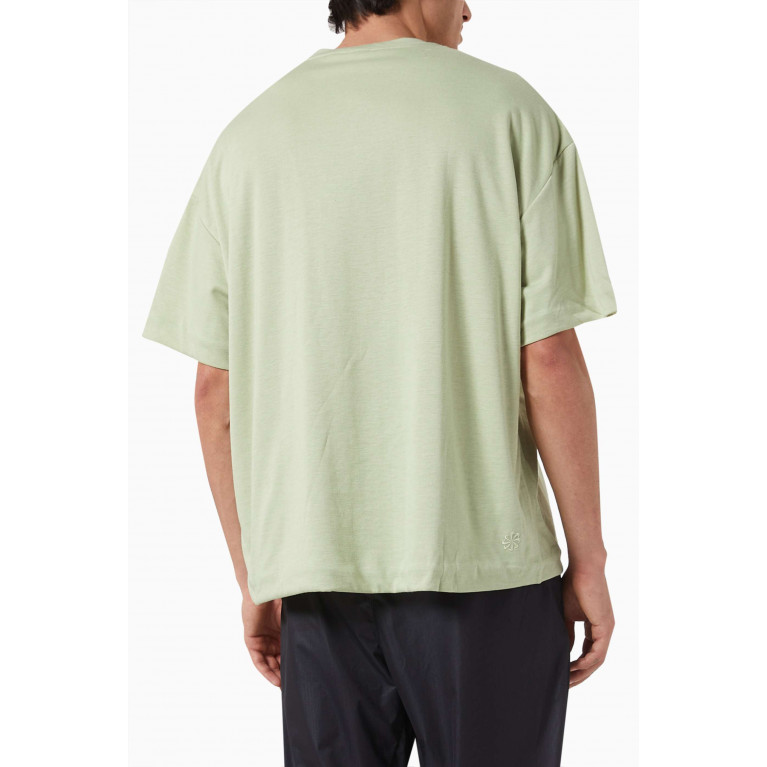 Nike - Oversized T-shirt in Dri-FIT Green