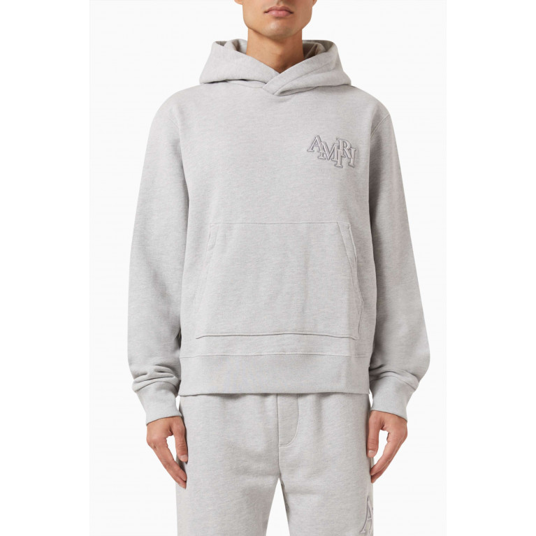 Amiri - Staggered Logo Hoodie in Cotton Terry