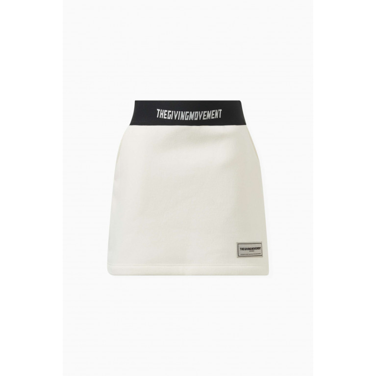 The Giving Movement - Logo Tape Skirt in Organic Cotton Neutral