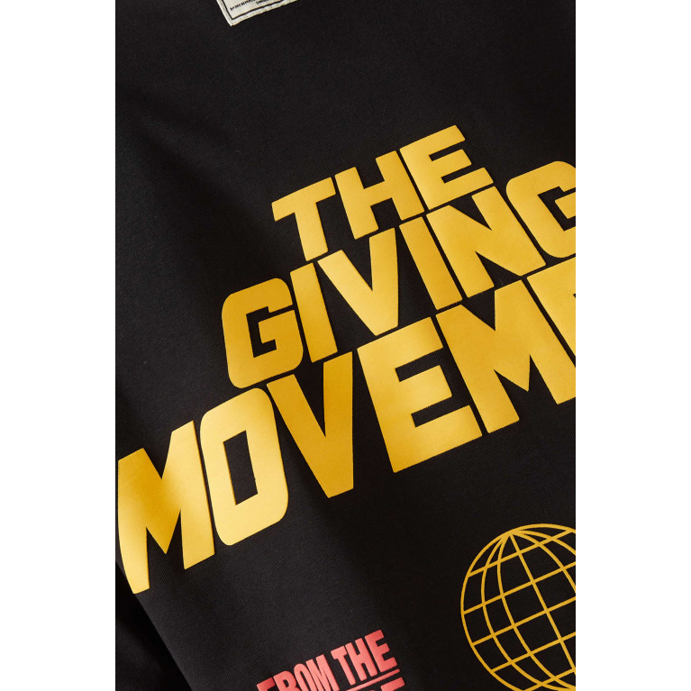 The Giving Movement - Oversized Bold T-shirt in Cottonsey100© Black