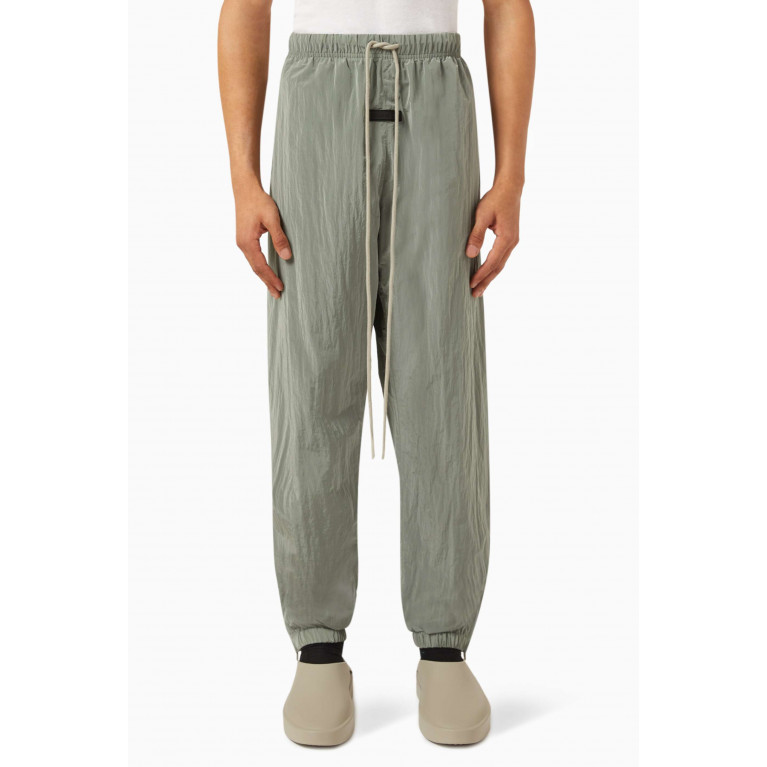 Fear of God Essentials - Logo Trackpants in Crinkle Nylon