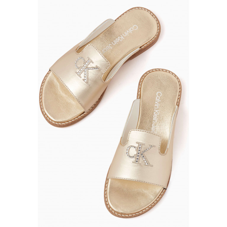 Calvin Klein - Logo Slip-on Sandals in Metallic-leather